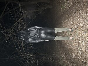 Young sissy in leather night walk forest