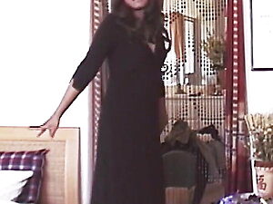 Video from my archive videos from the 2000s. Finally sharing the full video for everybody to enjoy. Wearing my black dress as I dance, seduce, and finally cumming at the end on the bed.