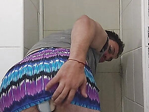 Enjoying with micro thong in the bathroom