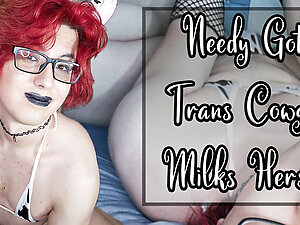 She's a goth cow girl who really can't control herself. The desperate need to get off is written all over her—her moans, the way she's stroking her cock, the way she just has to milk herself.
