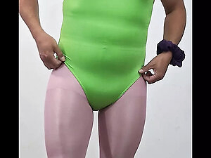 In this video I'm wearing workout clothes, but I take them off and stick to my green bodysuit and pink tights. I just touch myself and finish inside :P